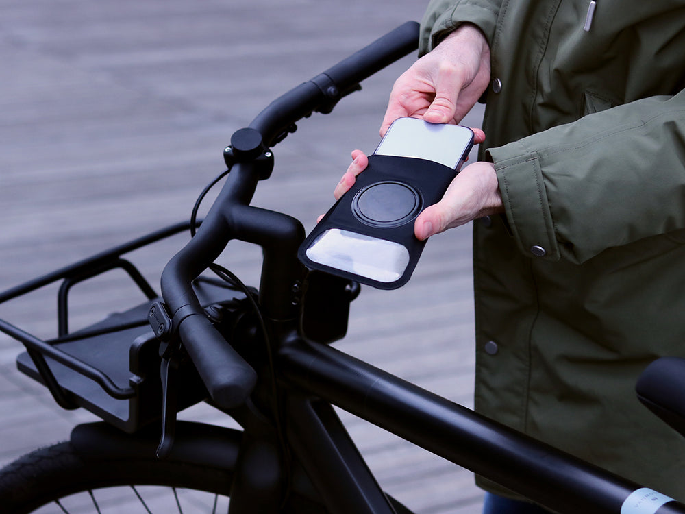 Funda magnética Shapeheart para soporte de bicicleta PRO - vista detallada. Ilustración de la funda magnética incluida, ideal para asegurar tu teléfono y tenerlo fácilmente accesible.